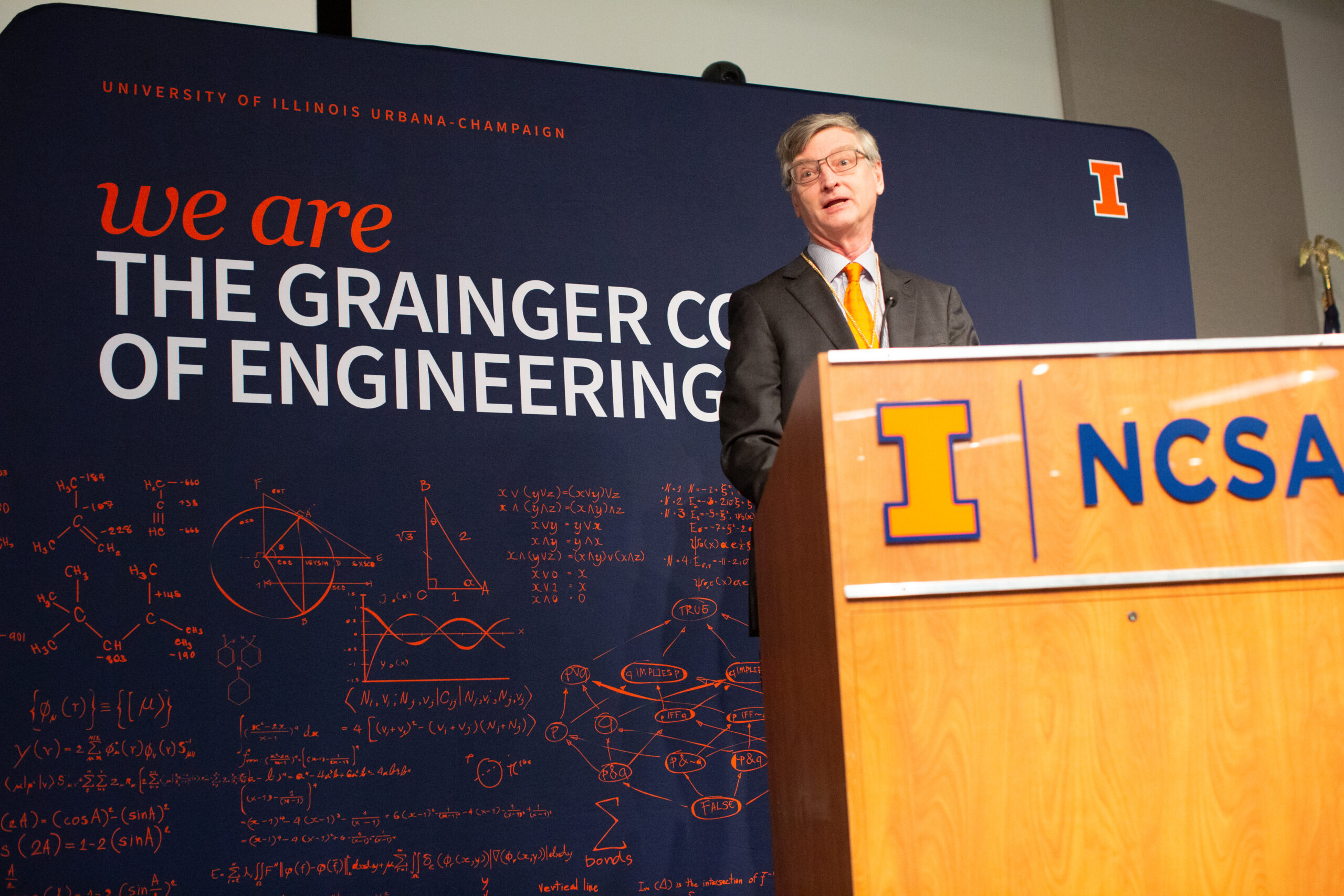 Bill Gropp speaks at a podium.