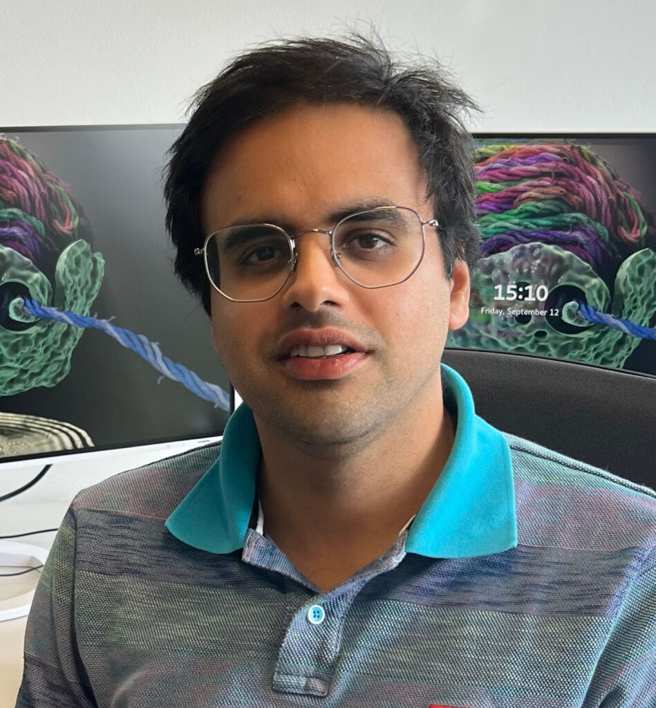 Kush Coshic smiles at the camera.